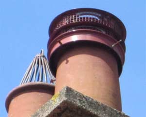 Add a vented cap or cowl to your chimney pot