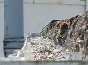 Blocked guttering can cause water to overflow