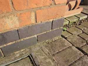 Engineering bricks used as a damp proof course