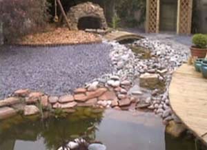 Curved deck in a low maintenance garden