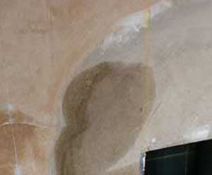 Hygroscopic salts cause damp patches that appear temporarily