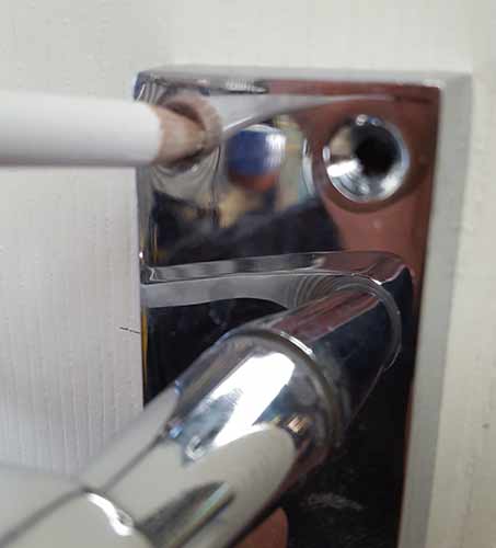 Marking door handle screw holes