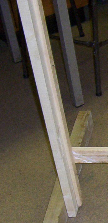 Timber fixed at base of jambs to keep it square