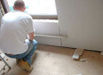 Fixing more plasterboard to the wall