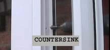 Countersinking screw heads into window frame