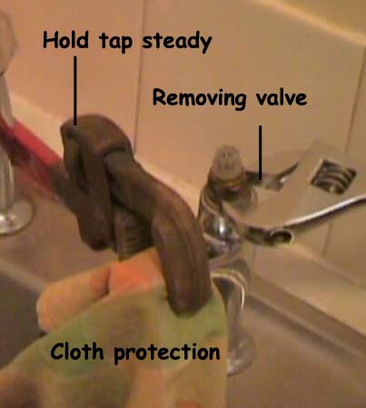 Undo the tap valve completely and remove