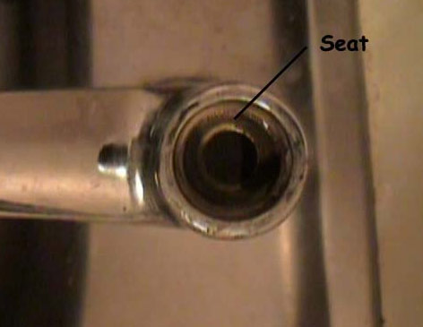 Tap valve seat inside pillar of tap