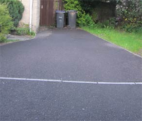 Narrow tarmac driveway