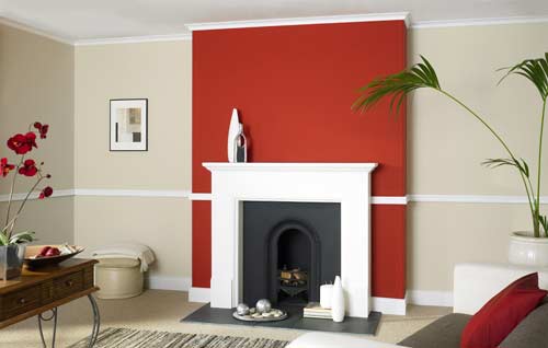 Red feature wall around fireplace