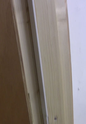 Intumescent strip fitted retrospectively to door frame
