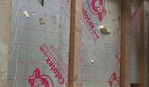 Solid insulation in a ceiling void