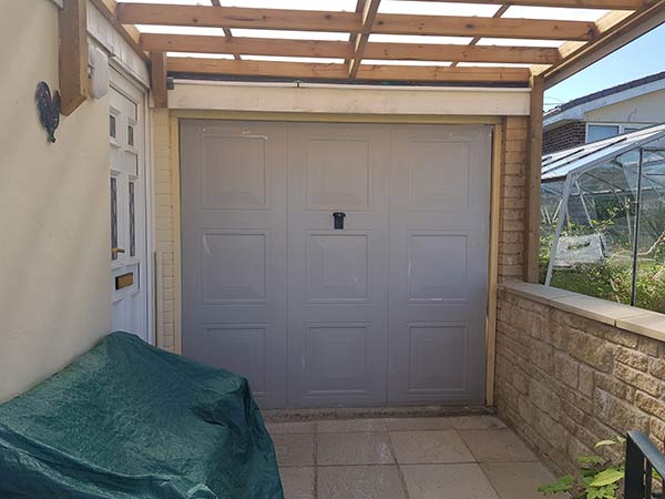 Newly replaced metal garage door