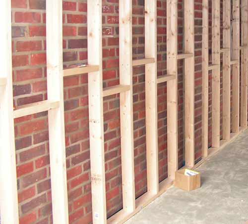 Battening walls for insulating