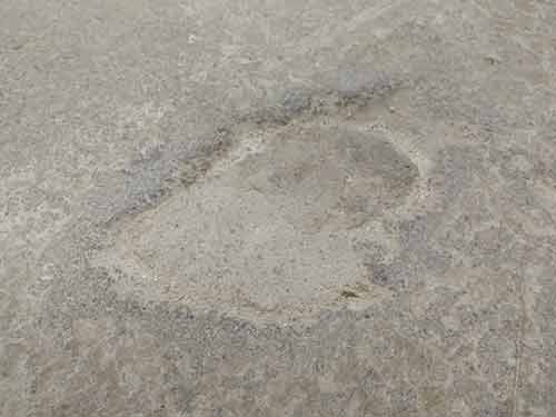 Damaged garage floor