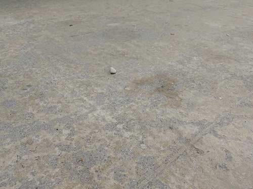 Dusty un-treated garage floor