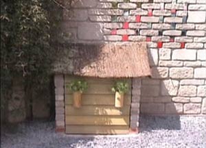Pump House with Thatched Roof