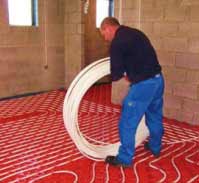 Underfloor heating system pipework being layed