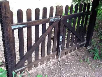 Double wooden picket garden gate