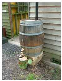 Wooden barrel style water butt