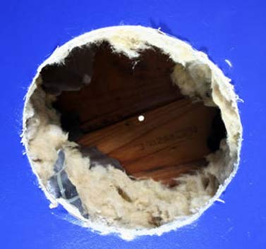 Hole cut in ceiling