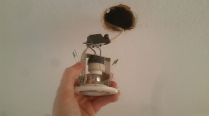 Downlight connected and ready for inserting into ceiling