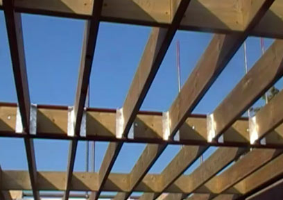 Joists hung on RSJ using saddle hangers