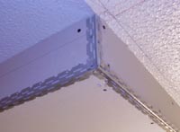 Close-up of corner beads on the lighting box