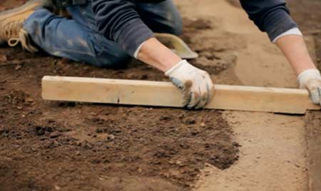 Levelling sub base up to edging stones