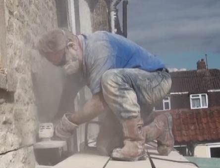 Cutting a lead chase in stonework