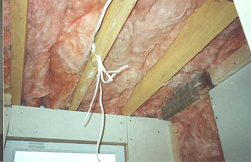 Insulation placed in between floor and ceiling joists