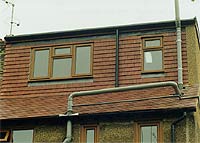 Completed loft conversion, building inspector checked final items and scaffolding removed