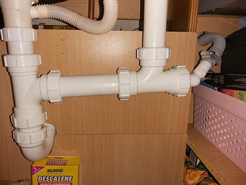 Sink plumbing setup for sink and strainer