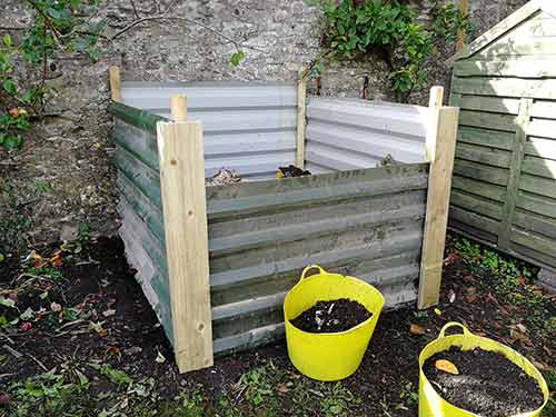 Front edges of compost bin covered over