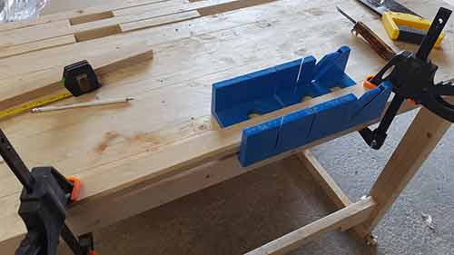 Timber clamped firmly in mitre block