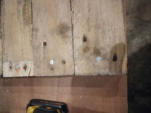 Base secured to battens with screws