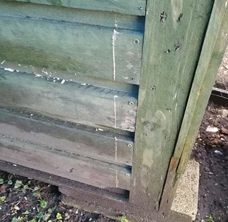 Cutting area marked out on rear of chicken coop