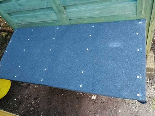 Roof fitted in place on top of nesting box