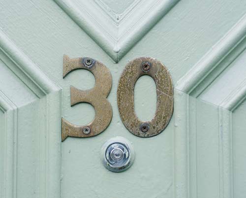 Door numbers fixed to front door