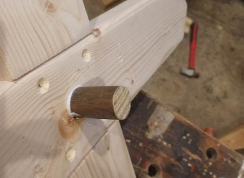 Wooden dowel glued into office chair base