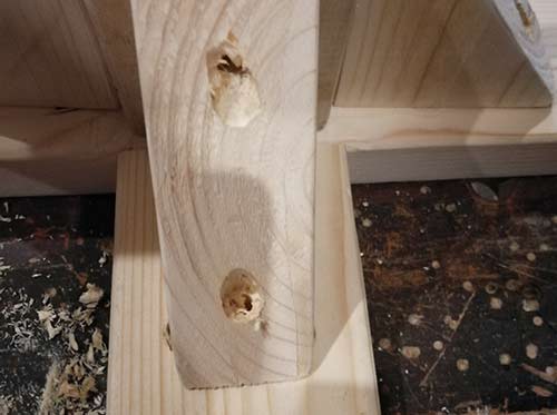 Recess and holes drilled in timber support bracket