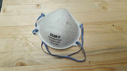 Dust mask used when sanding down