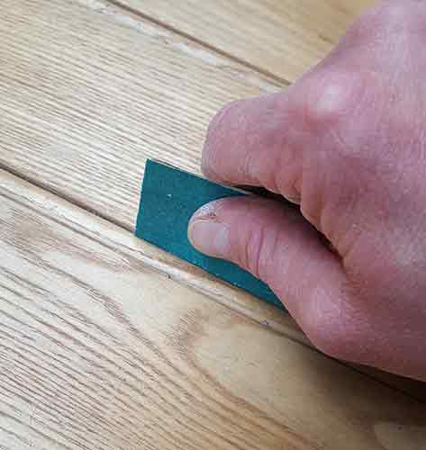 Folded sand paper to get into tight spaces