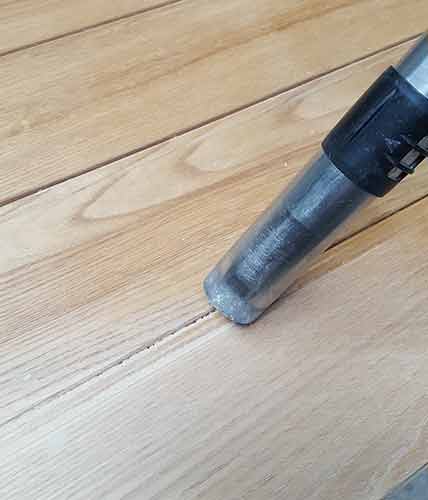 Vacuum off dust from the door