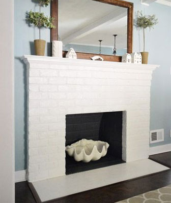 Minimal white painted fireplace