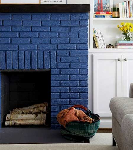 Dark blue painted fireplace - Image courtesy of Pinterest