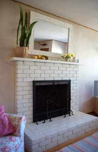 A beautifully painted brick fireplace