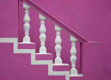 Wooden staircase painted to contemporary style