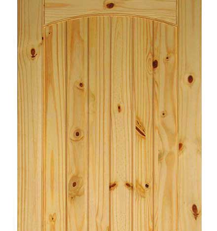 Knots in pine panel door