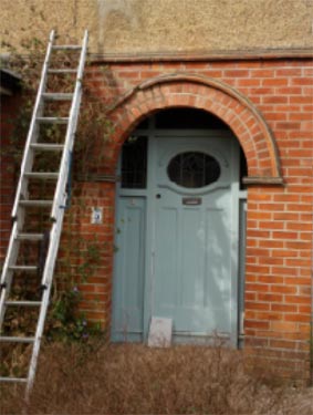 Brick archway to permitted development porch