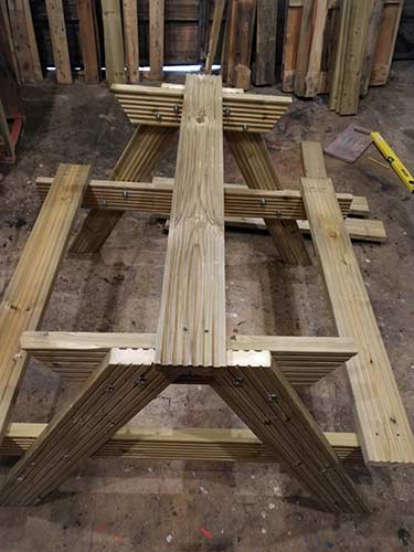 First 2 seating timbers fixed to picnic bench